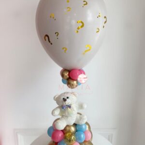 Balão branco com pontos de interrogação dourados, base decorativa e pelúcia fofa. Ideal para revelações de sexo sofisticadas e intimistas.