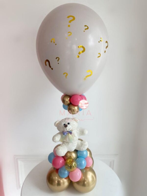 Balão branco com pontos de interrogação dourados, base decorativa e pelúcia fofa. Ideal para revelações de sexo sofisticadas e intimistas.